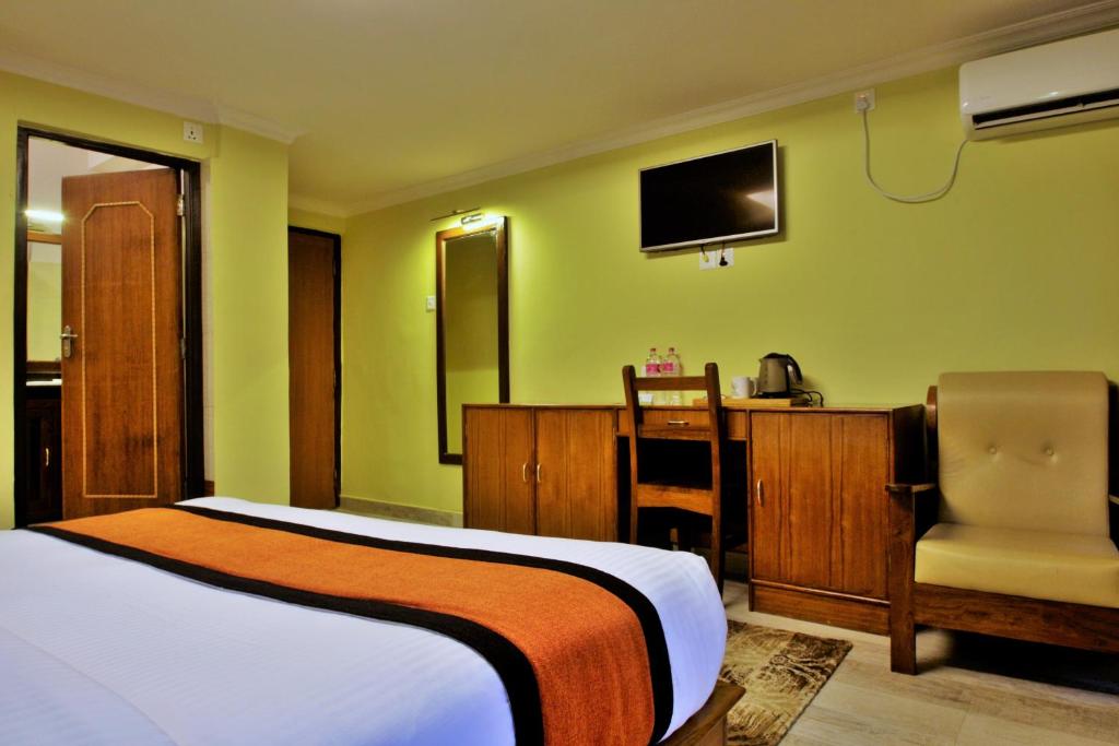 Sjónvarps- og/eða afþreyingartæki á Hotel Raniban Arcade