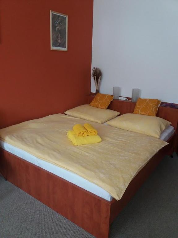 Postel nebo postele na pokoji v ubytování Apartmán Olomouc 2+KK