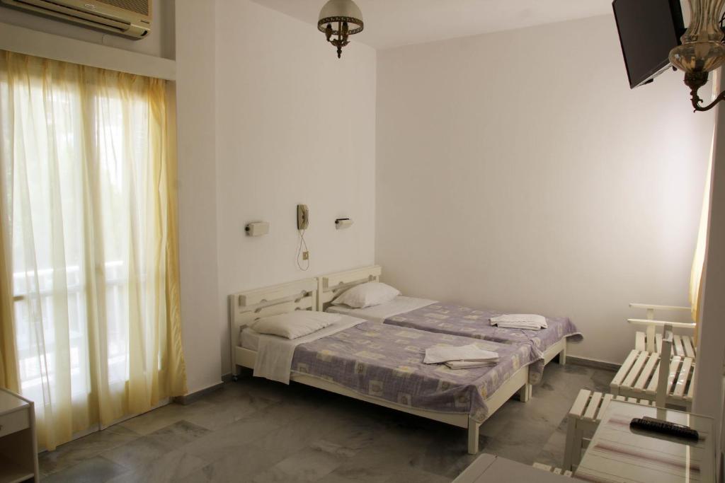 Voodi või voodid majutusasutuse Hotel Zannet toas
