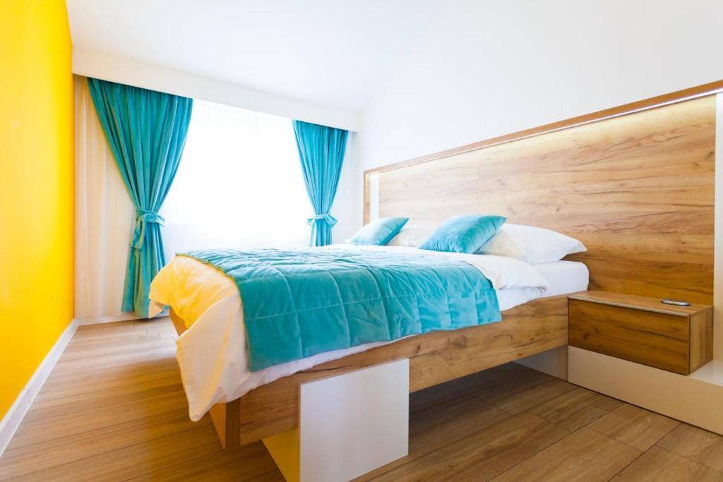 Кровать или кровати в номере Žal Beach Apartments