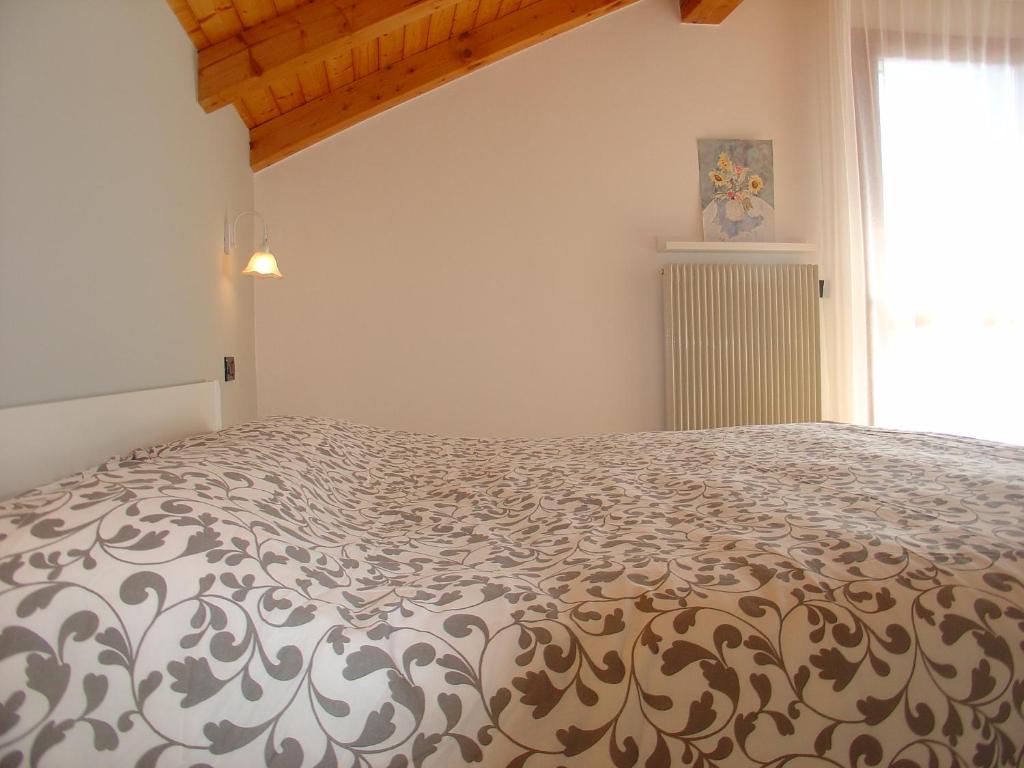 A bed or beds in a room at Casa Solaris