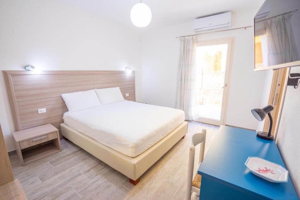 Un pat sau paturi într-o cameră la La Stradetta