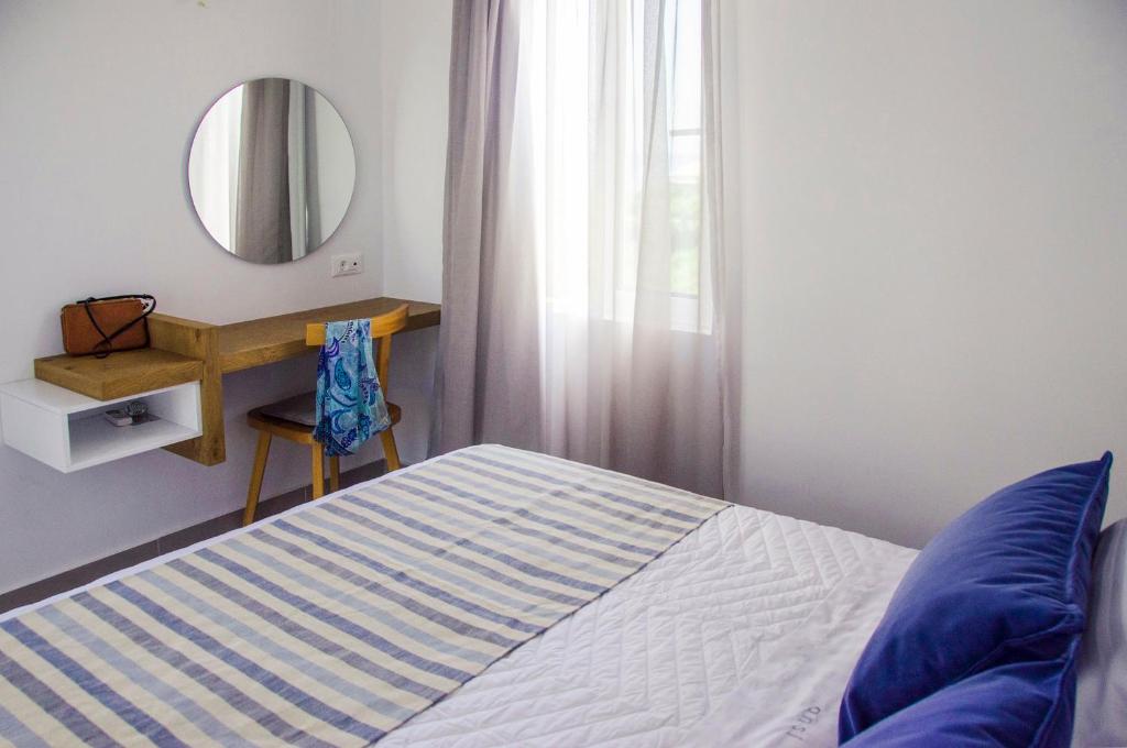 Postel nebo postele na pokoji v ubytování Ansi Studios & Apartments