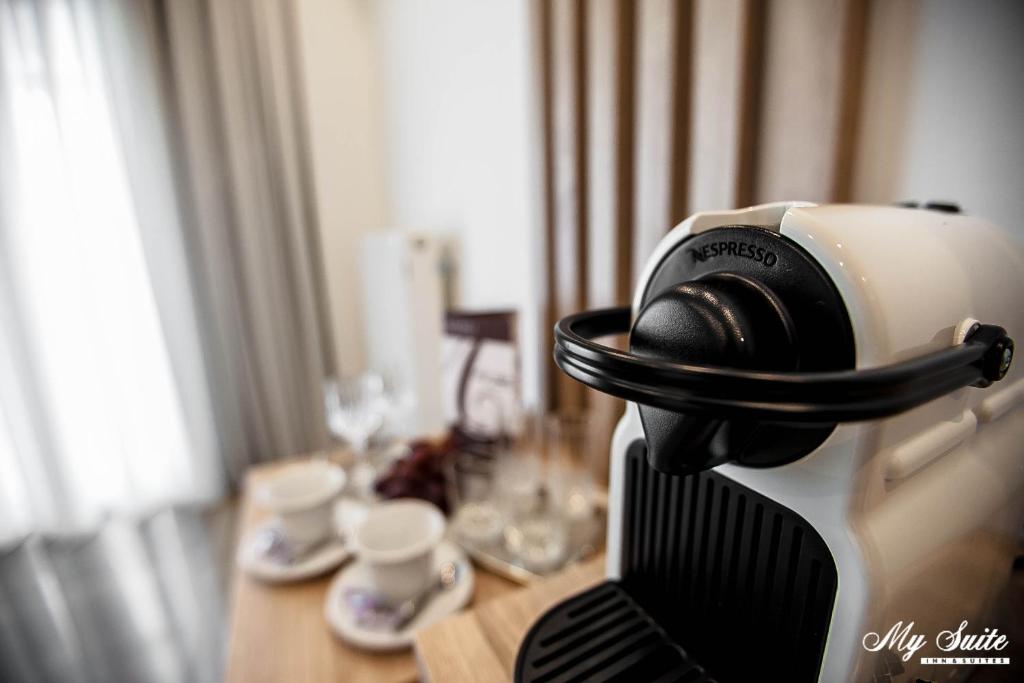 Příslušenství pro přípravu čaje a kávy v ubytování My Suite Boutique Hotel