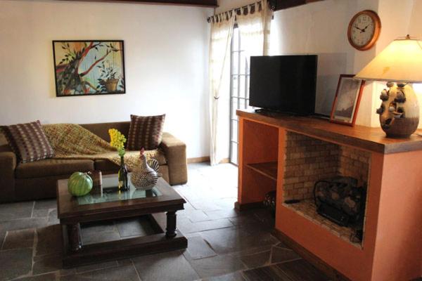 TV a/nebo společenská místnost v ubytování Hotel Villa Cassis
