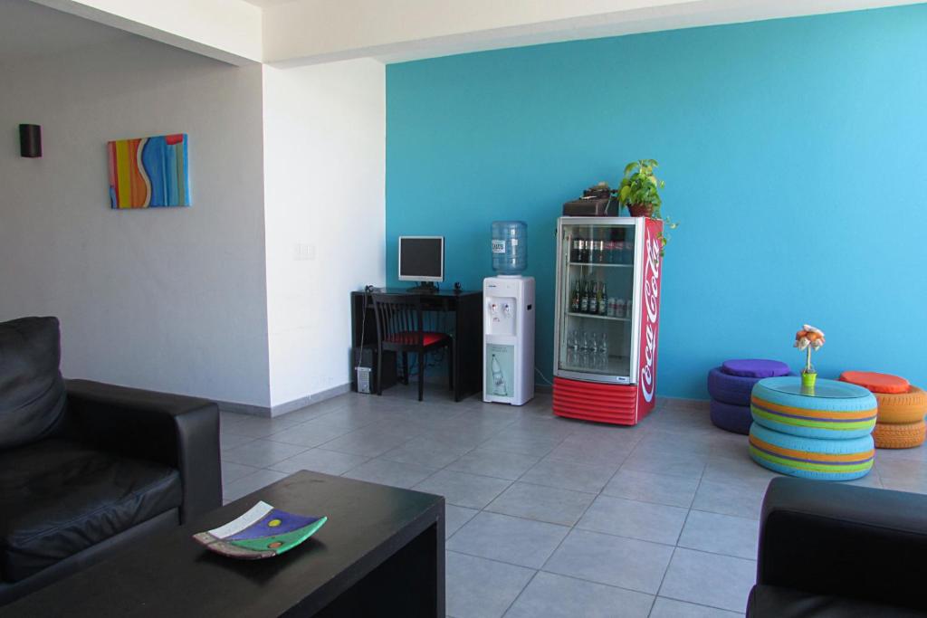 Posezení v ubytování Hostel de los Colores
