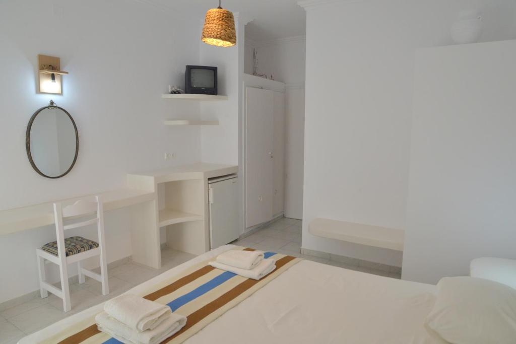 Postel nebo postele na pokoji v ubytování Corali Hotel