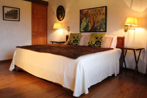 Postel nebo postele na pokoji v ubytování Hotel Villa Cassis