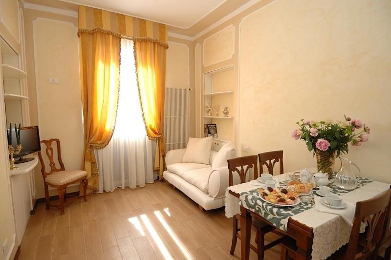 A seating area at Corte dei Santi