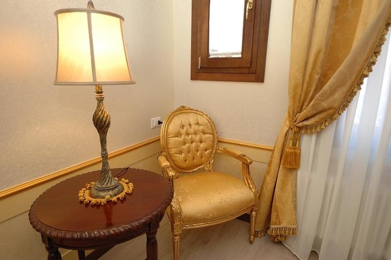 A seating area at Corte dei Santi