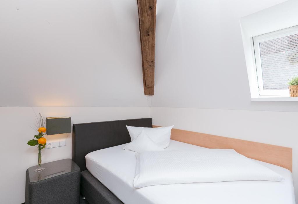 Postel nebo postele na pokoji v ubytování Das Hotel by Ferber
