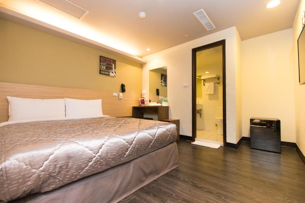 Postel nebo postele na pokoji v ubytování Chance Hotel