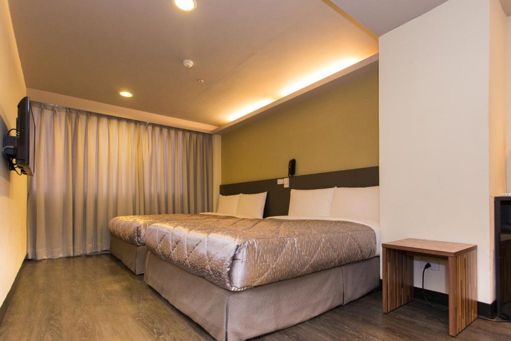 Postel nebo postele na pokoji v ubytování Chance Hotel