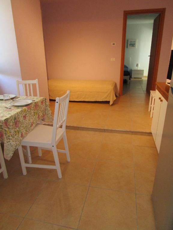Łóżko lub łóżka w pokoju w obiekcie Appartamenti Di Laura