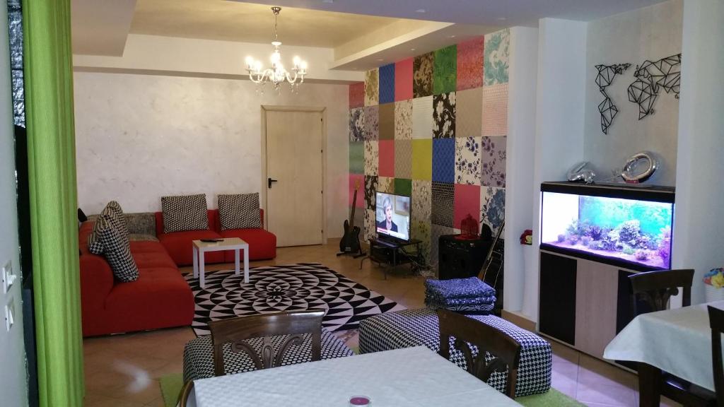 TV a/nebo společenská místnost v ubytování Il Gheppio