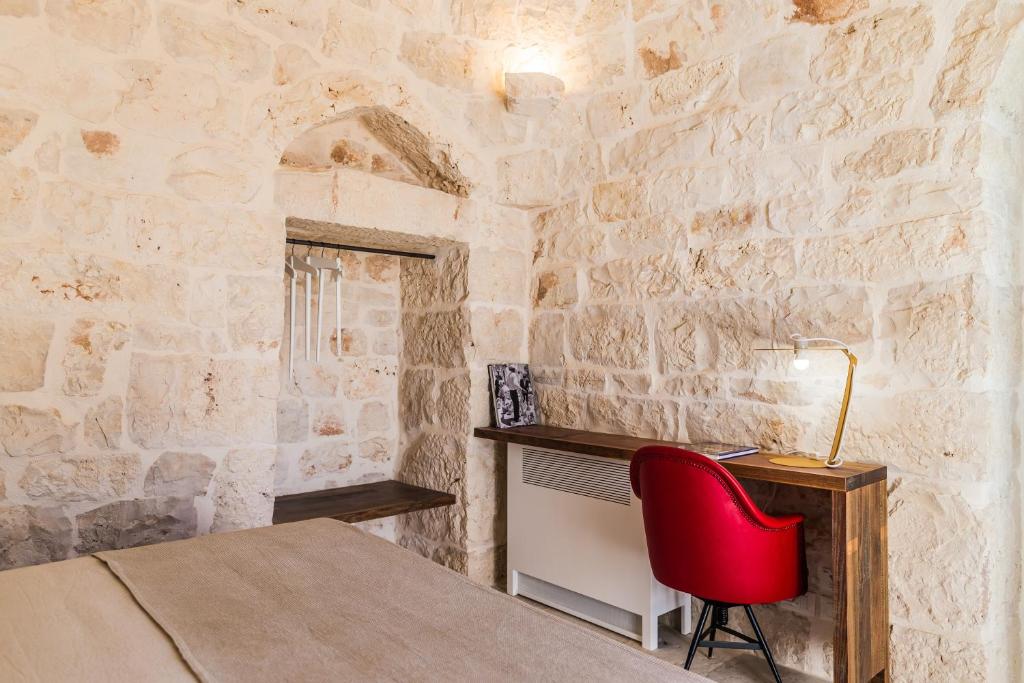 Postel nebo postele na pokoji v ubytování Borgo Canonica