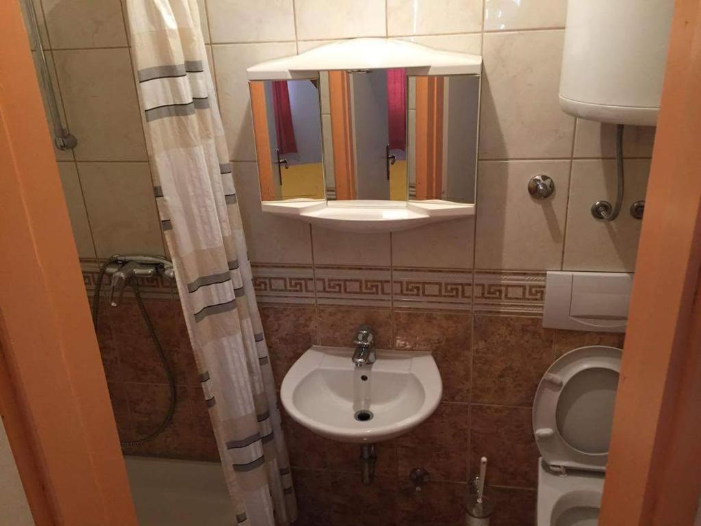 Koupelna v ubytování Apartmani Five