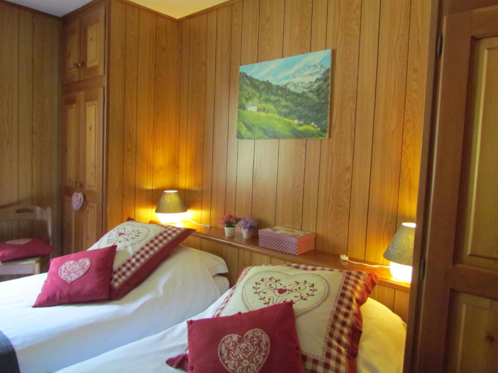 Postel nebo postele na pokoji v ubytování Hotel Lysjoch