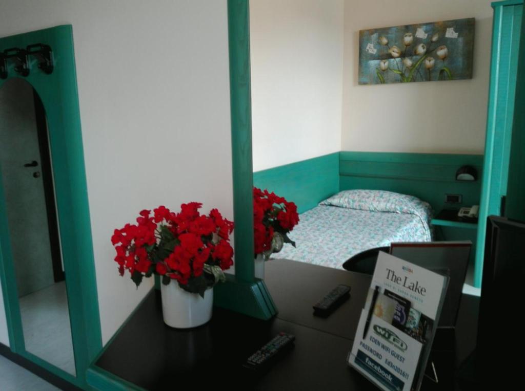 Postel nebo postele na pokoji v ubytování Hotel Eden