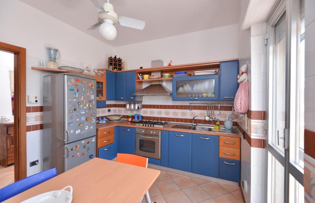 A kitchen or kitchenette at Appartamento Via Salento Gallipoli