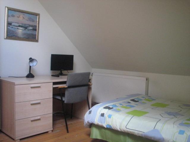 Postel nebo postele na pokoji v ubytování Little Amber Apartments