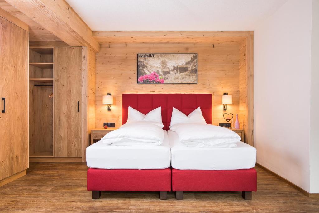 Voodi või voodid majutusasutuse Hotel Augarten toas