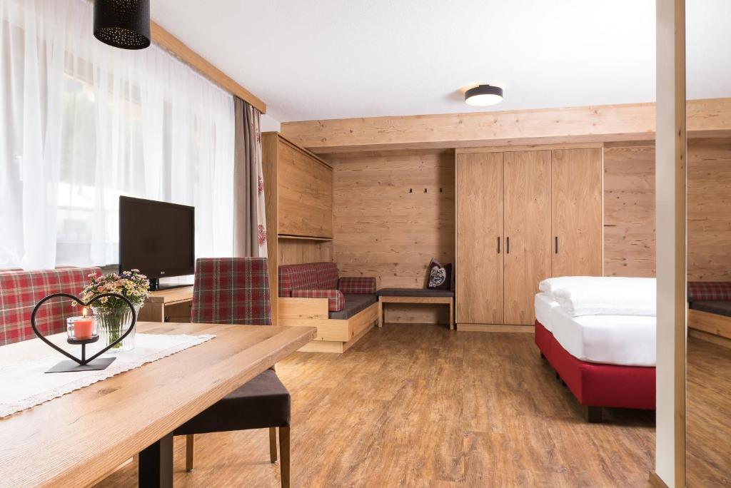 Voodi või voodid majutusasutuse Hotel Augarten toas