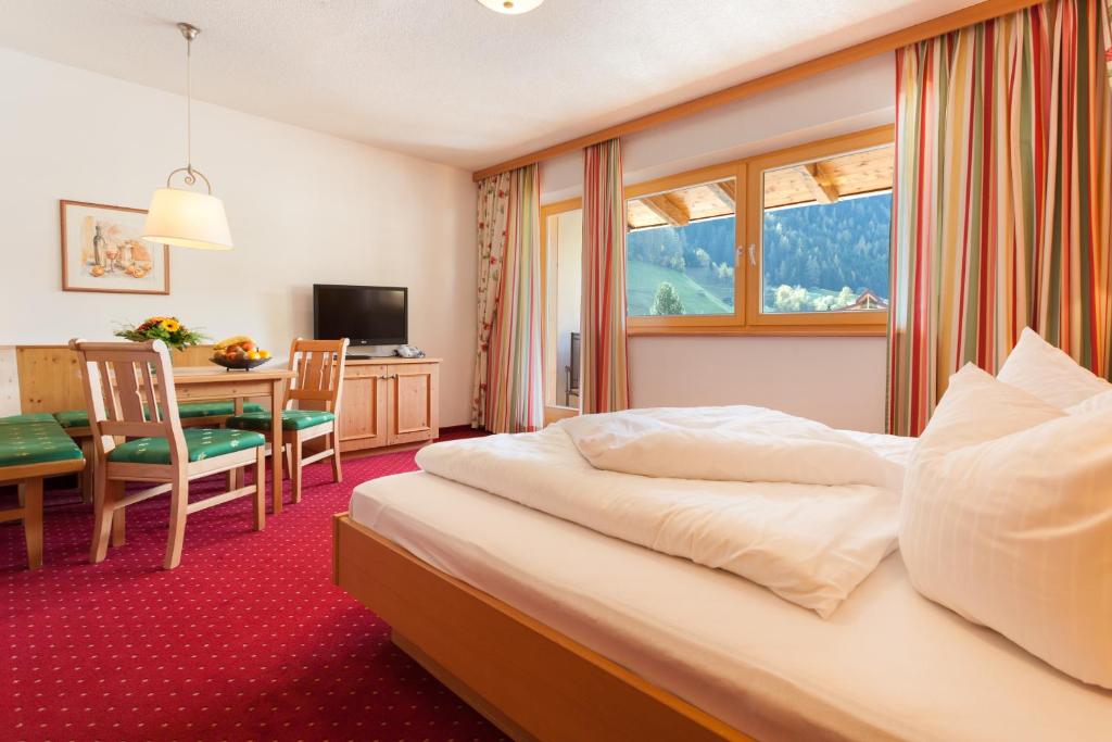 Voodi või voodid majutusasutuse Hotel Augarten toas
