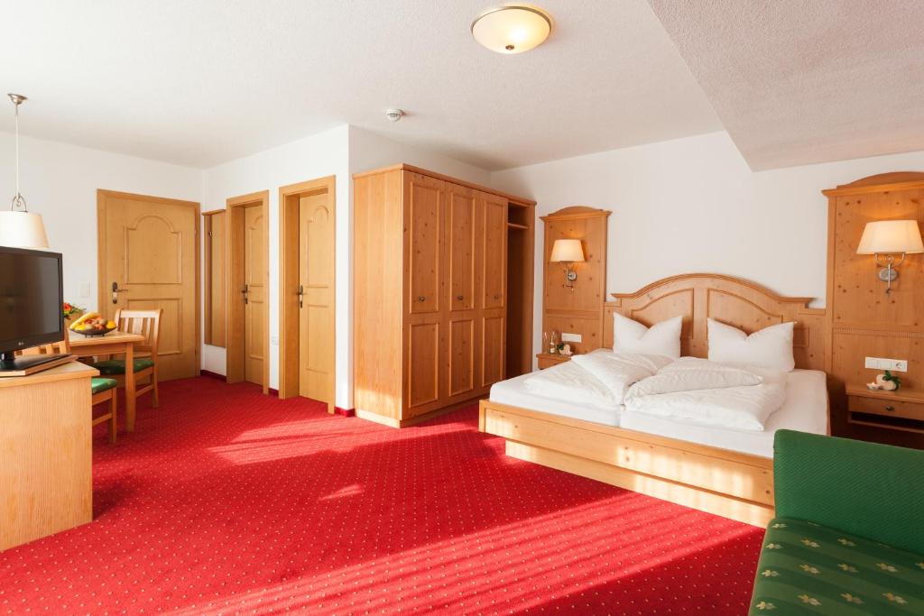 Voodi või voodid majutusasutuse Hotel Augarten toas