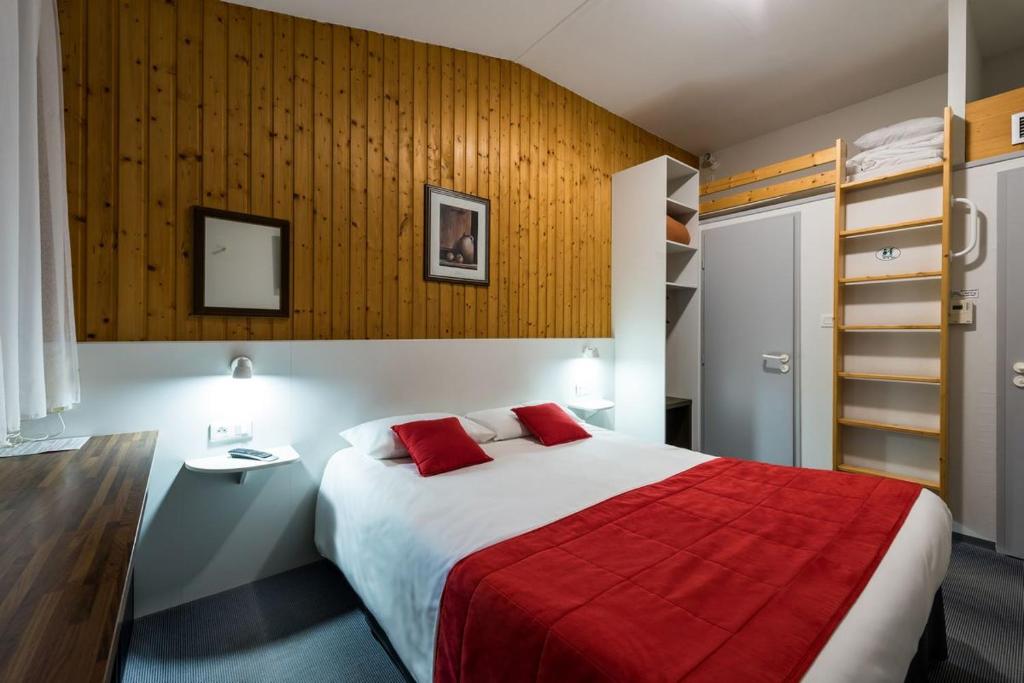 Postel nebo postele na pokoji v ubytování Fasthotel Thones