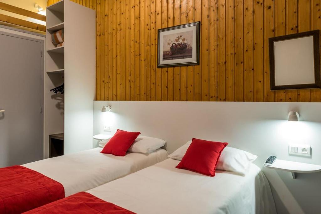 Postel nebo postele na pokoji v ubytování Fasthotel Thones