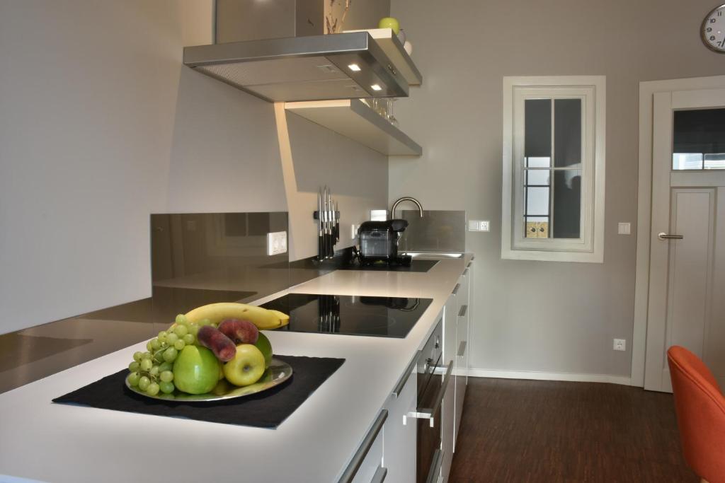 Kuchyň nebo kuchyňský kout v ubytování Carl.22 City Appartements