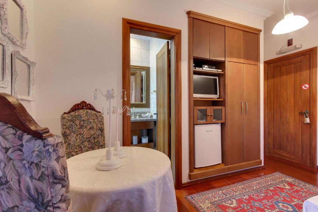 Kuchyň nebo kuchyňský kout v ubytování Hotel Pousada Florença