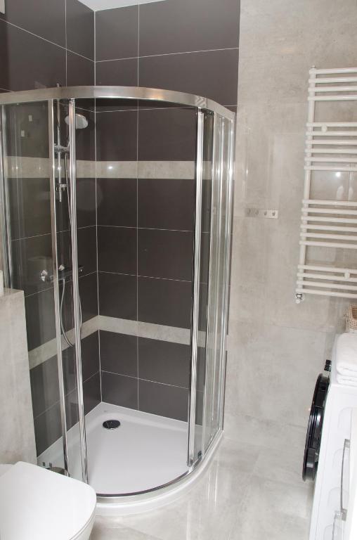 Kúpeľňa v ubytovaní Apartamenty Mariela-Kołobrzeg z garażem