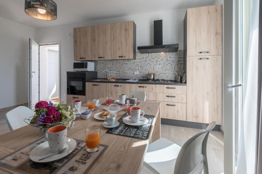 Kuchyň nebo kuchyňský kout v ubytování Calura Residence
