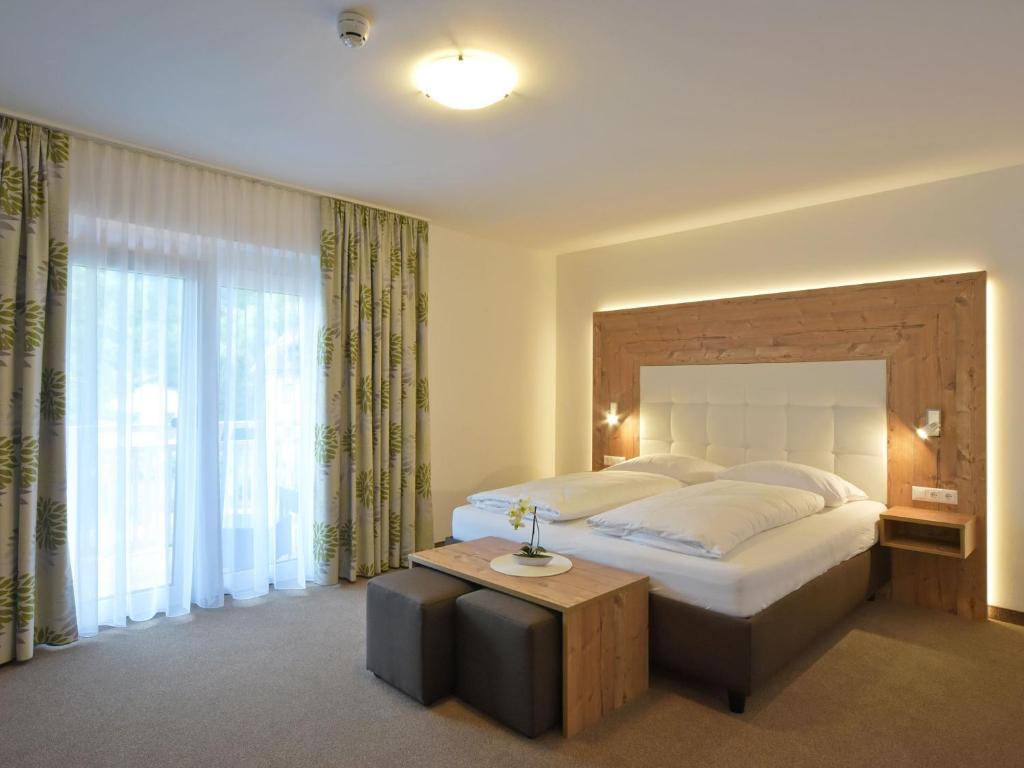 Voodi või voodid majutusasutuse Hotel Berghof toas