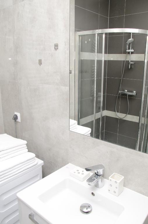 Kúpeľňa v ubytovaní Apartamenty Mariela-Kołobrzeg z garażem
