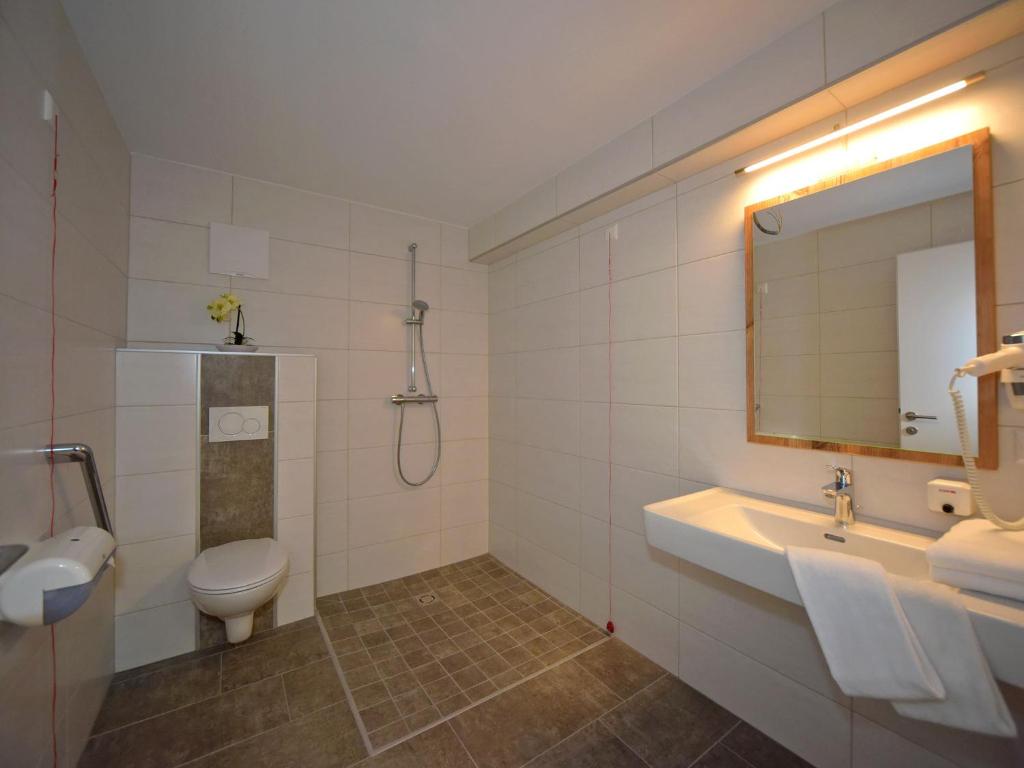 Vannituba majutusasutuses Hotel Berghof
