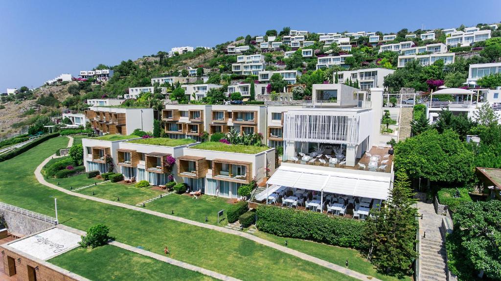 an aerial view of a building on a hill at Palmalife Hotel in Yalıkavak