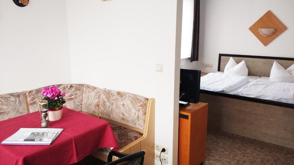 Postel nebo postele na pokoji v ubytování Pension Voss
