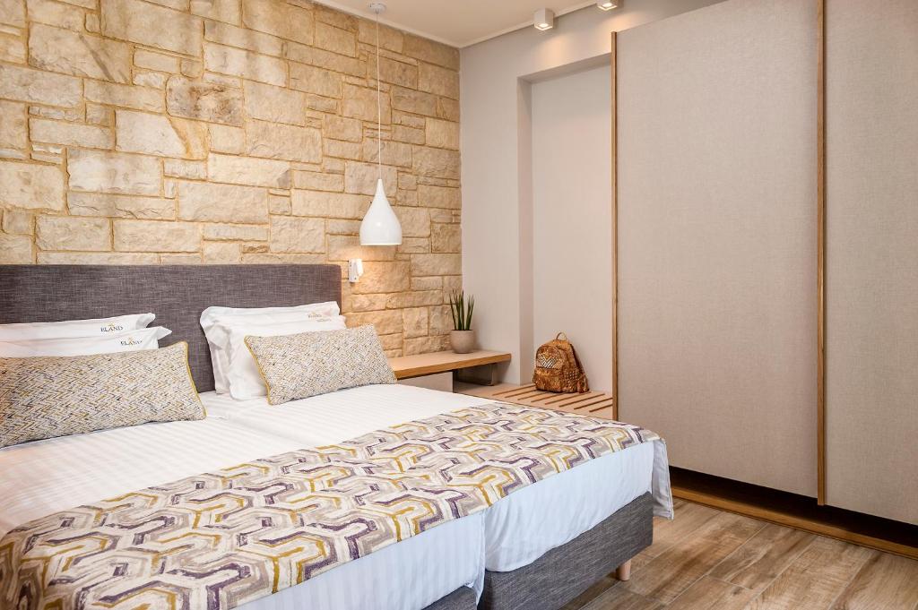 A bed or beds in a room at Eland Dream Villas
