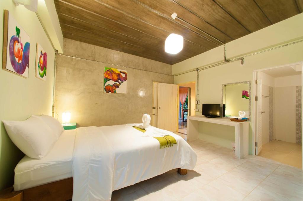 Postel nebo postele na pokoji v ubytování Baan Chokdee Pai Resort