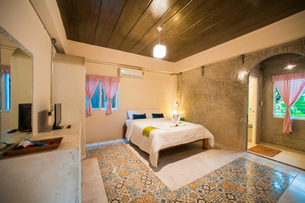 Postel nebo postele na pokoji v ubytování Baan Chokdee Pai Resort