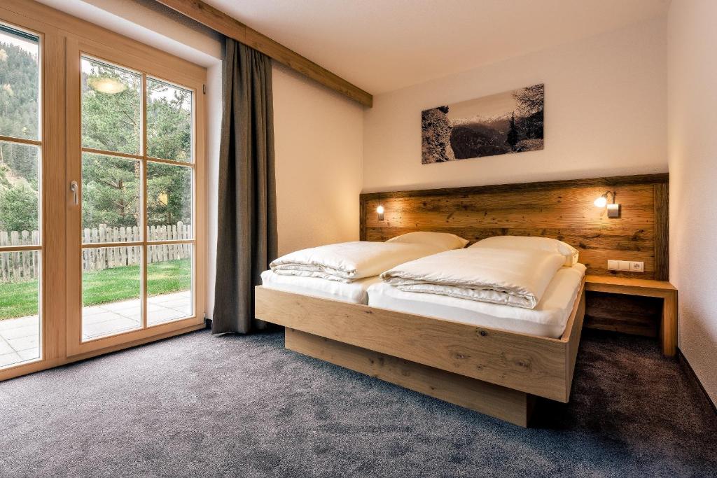 Posteľ alebo postele v izbe v ubytovaní Appartements Alexander