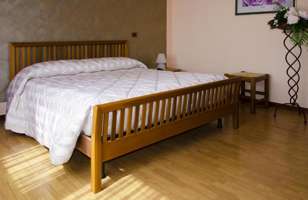 Postel nebo postele na pokoji v ubytování B&B La Palanca