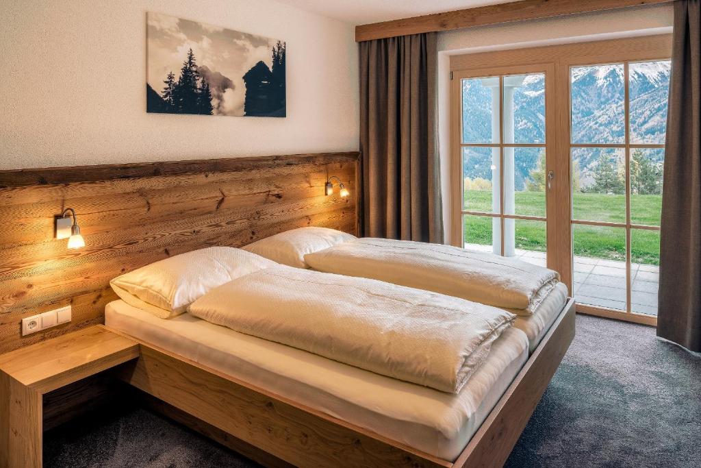 Posteľ alebo postele v izbe v ubytovaní Appartements Alexander