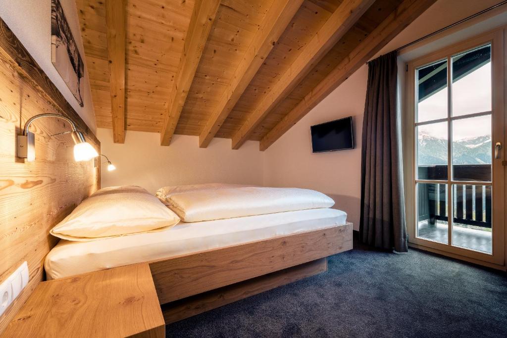 Posteľ alebo postele v izbe v ubytovaní Appartements Alexander