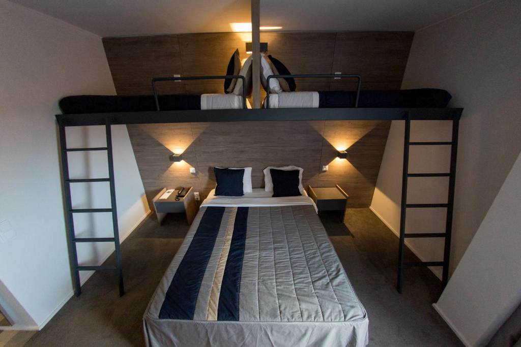 Postel nebo postele na pokoji v ubytování Hotel do Parque