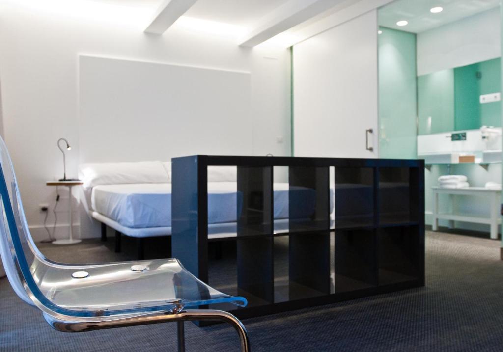 Postel nebo postele na pokoji v ubytování Artrip Hotel