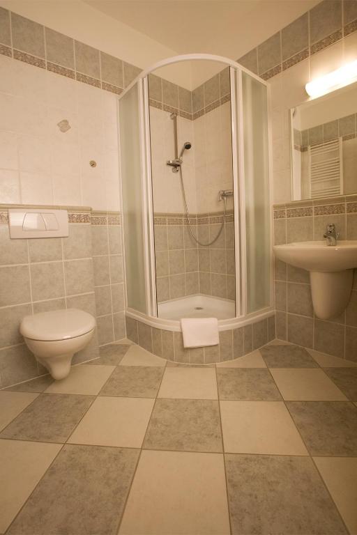 Koupelna v ubytování Hotel U Zlatého kohouta